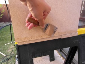 SAM_0344_Converted A sharp metal kitchen spatual doubles as a glue scraper.